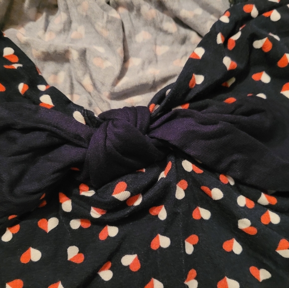 Colorful sleeveless top with bow at neck line. - Picture 2 of 4